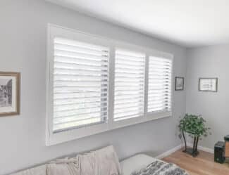 White Plantation Shutters On The Living Area